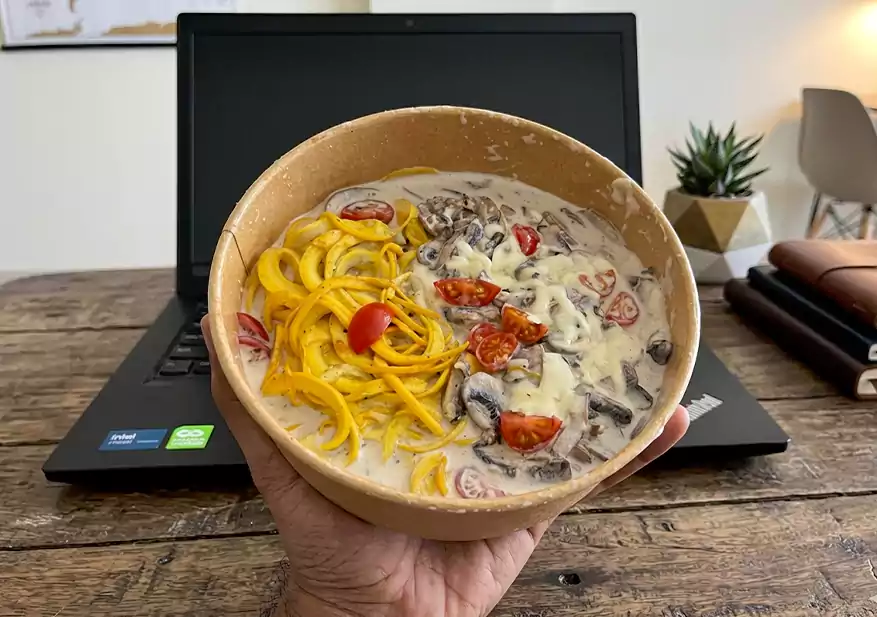 Creamy pasta bowl with mushroom sauce and roasted cherry tomatoes