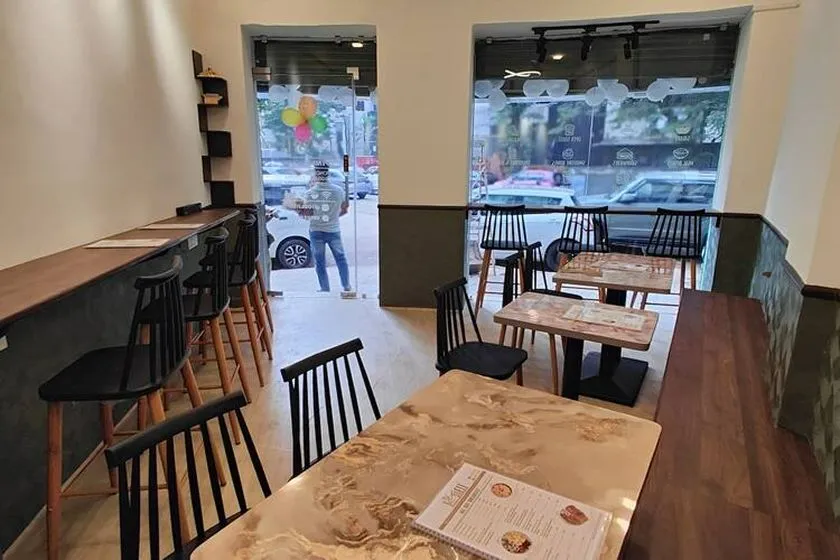 Modern dining area inside Toss Fit healthy food restaurant in Mumbai